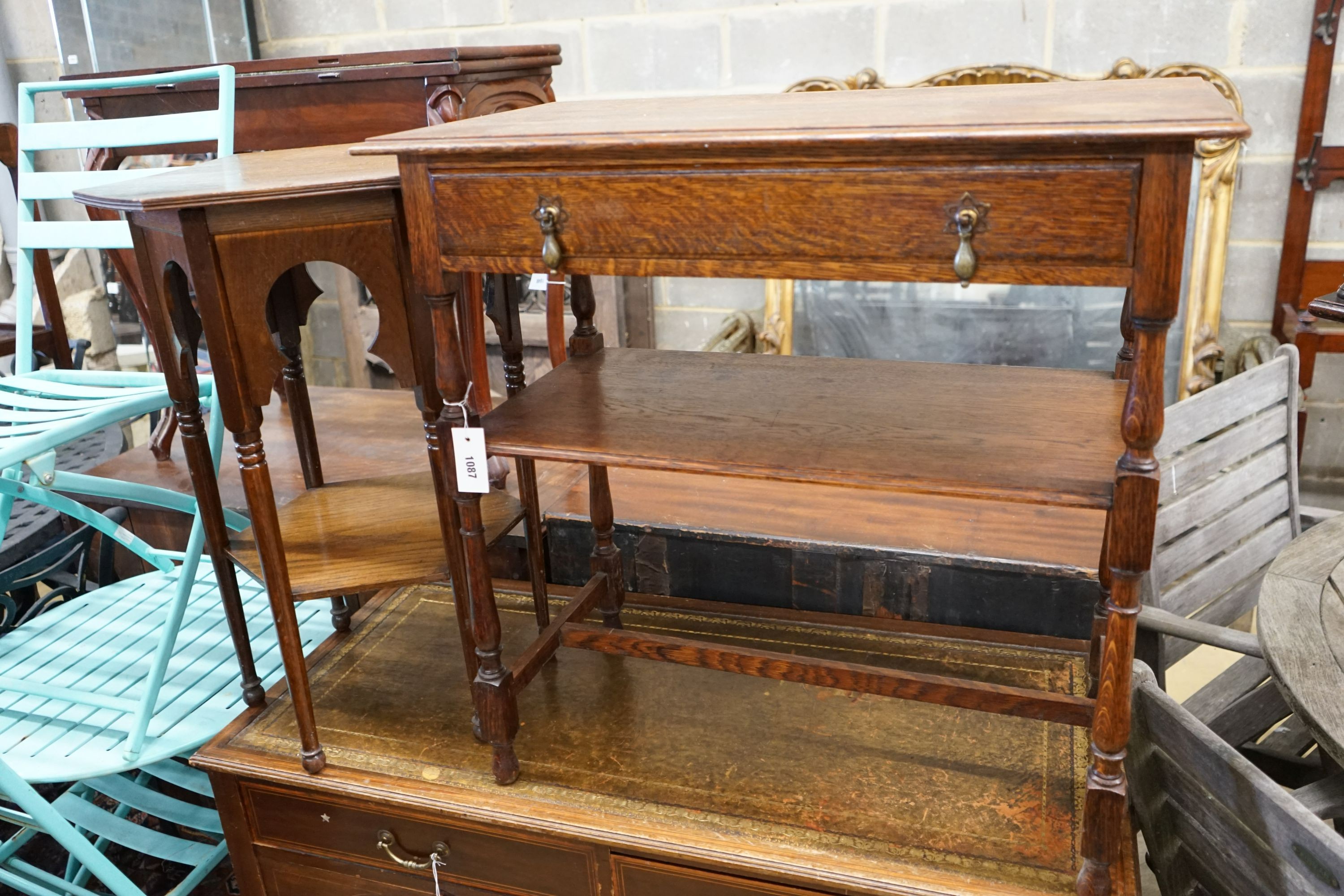 A Liberty style hexagonal oak two tier table, width 47cm, height 71cm together with a rectangular oak two tier table